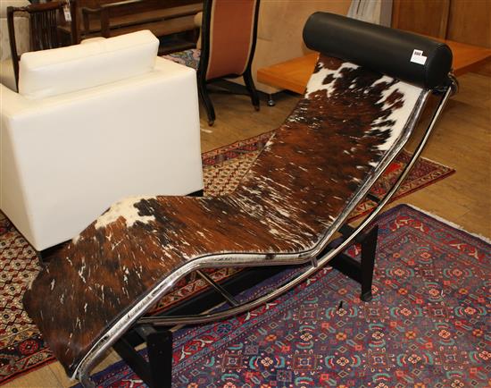 A modernist chromed and black painted steel day bed with pony skin upholstery, L.156cm W.58cm H.80cm